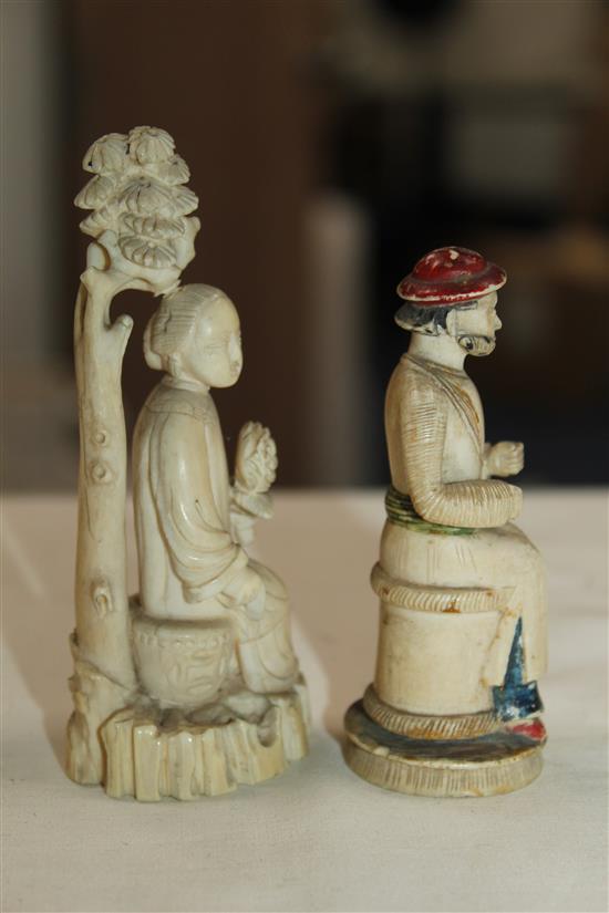 A Chinese ivory figure of a lady seated beneath a tree and an Indian ivory figure of a seated man, 19th century, 10.5 and 8.5cm